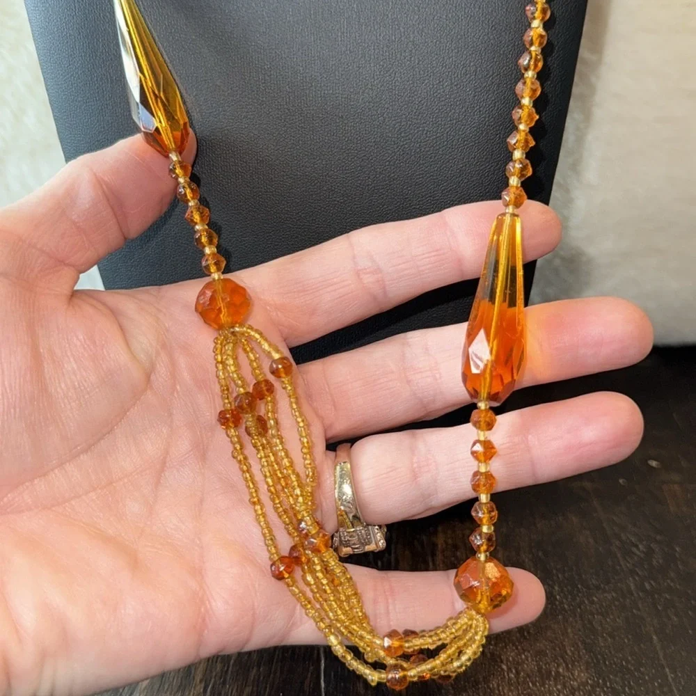 Pretty long amber/ brown colored beaded necklace boho hippie western